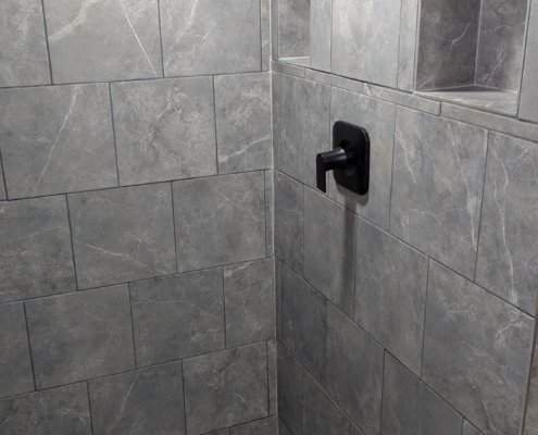Walk in shower tiles installed