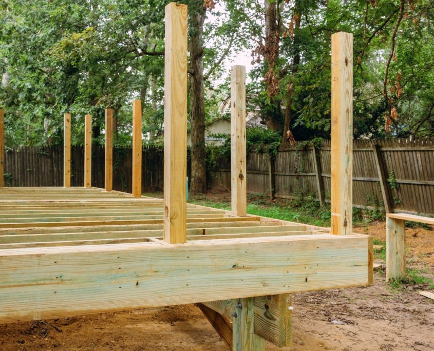 Installing wood floor for patio deck with new wooden planks